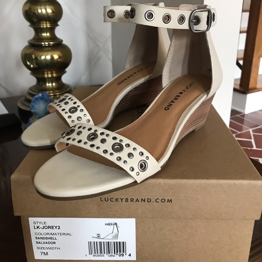 Women’s cream colored wedge